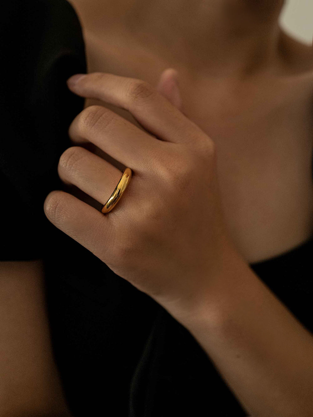 A polished gold ring.