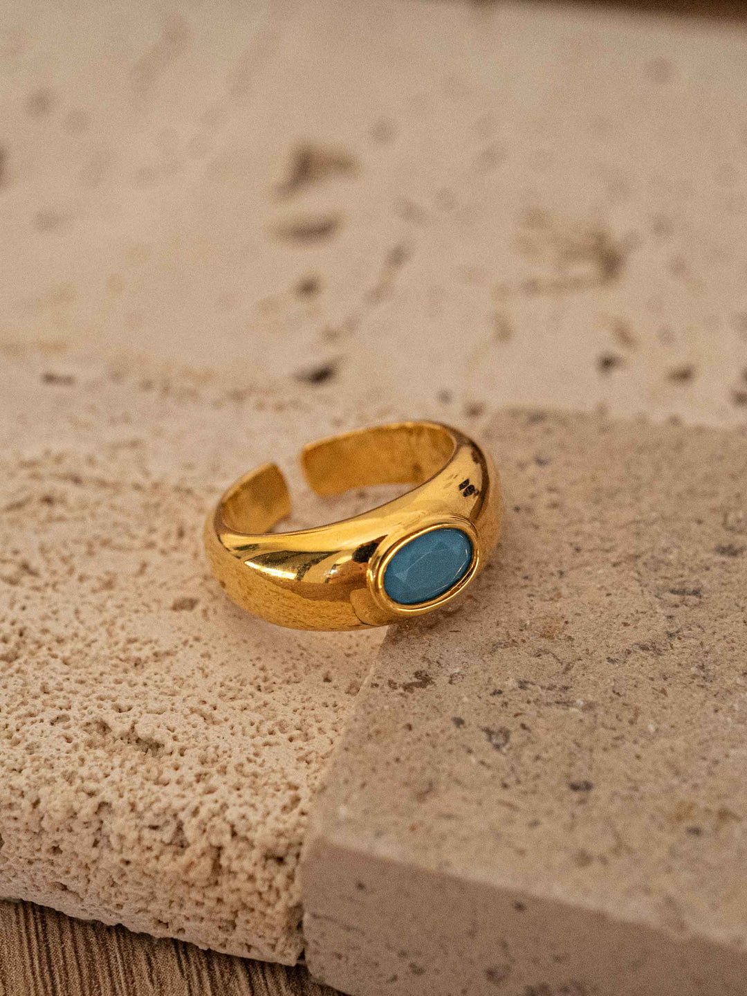 A turquoise gold ring.