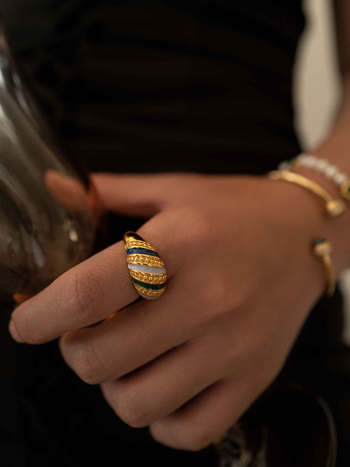 a hand with A vintage gold ring