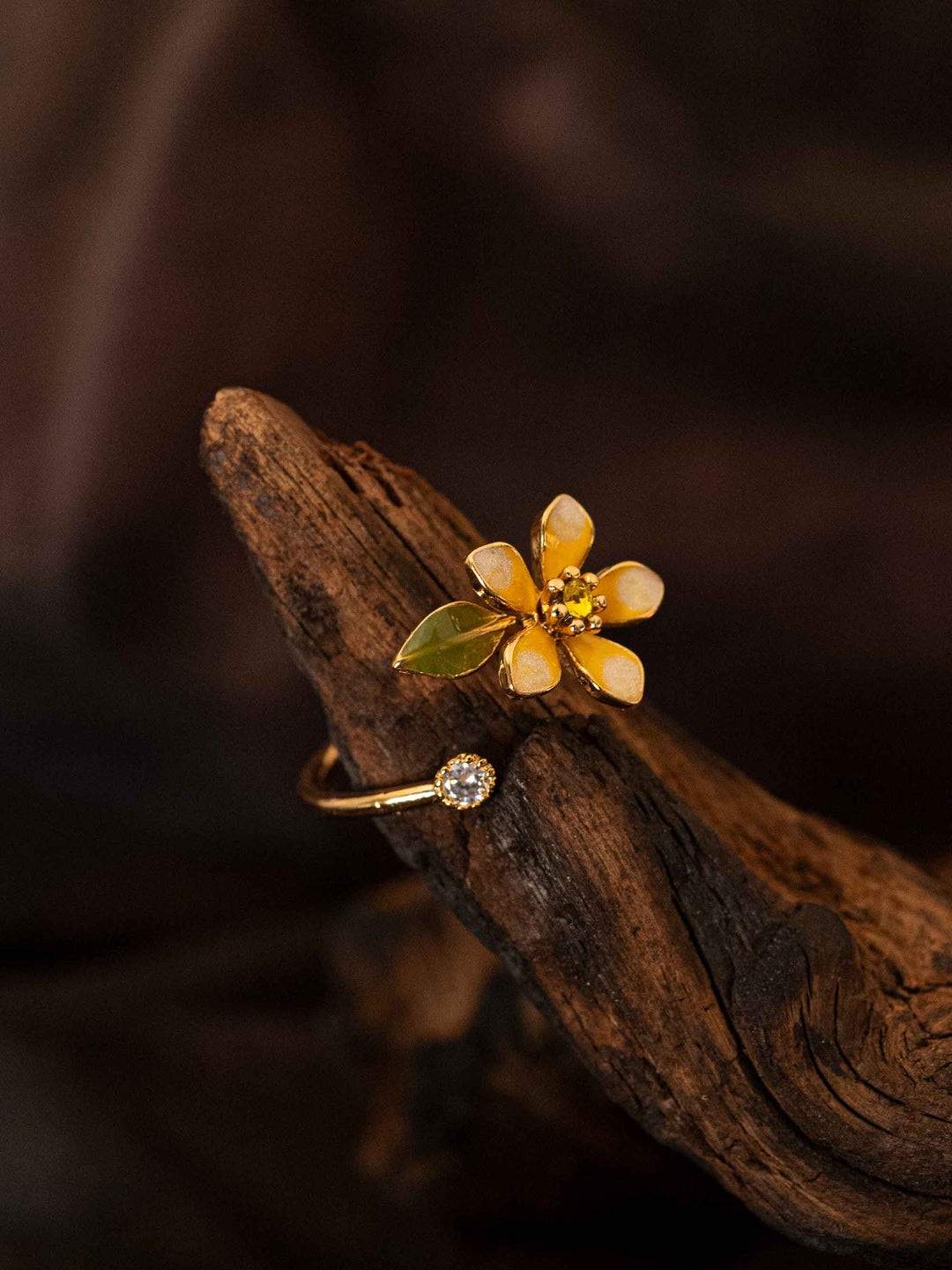 A gold floral ring