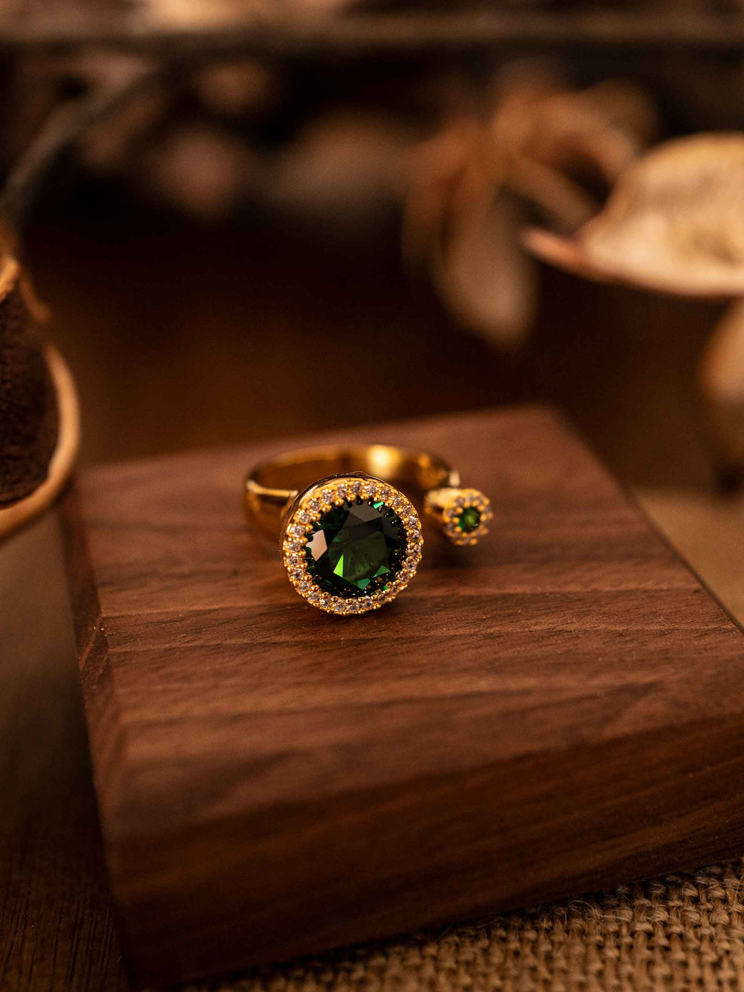 A green gemstone gold ring