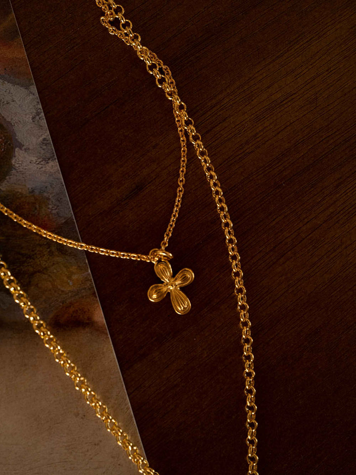 A double-layered design Catholic cross necklace