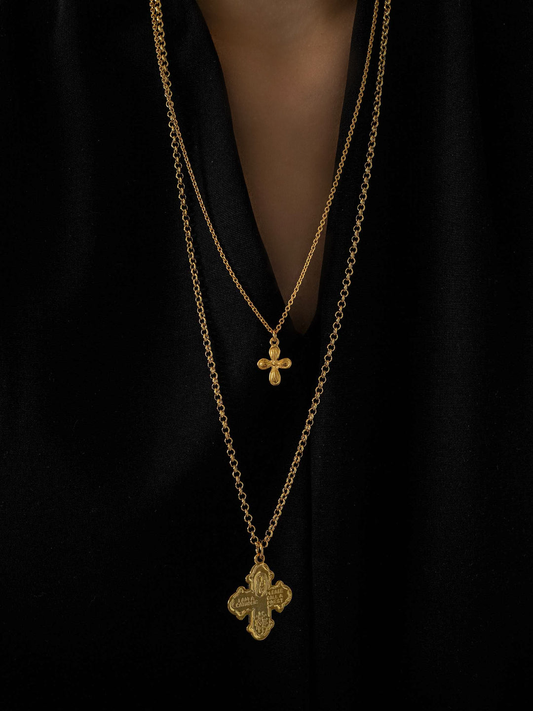 a model wear A double-layered design Catholic cross necklace