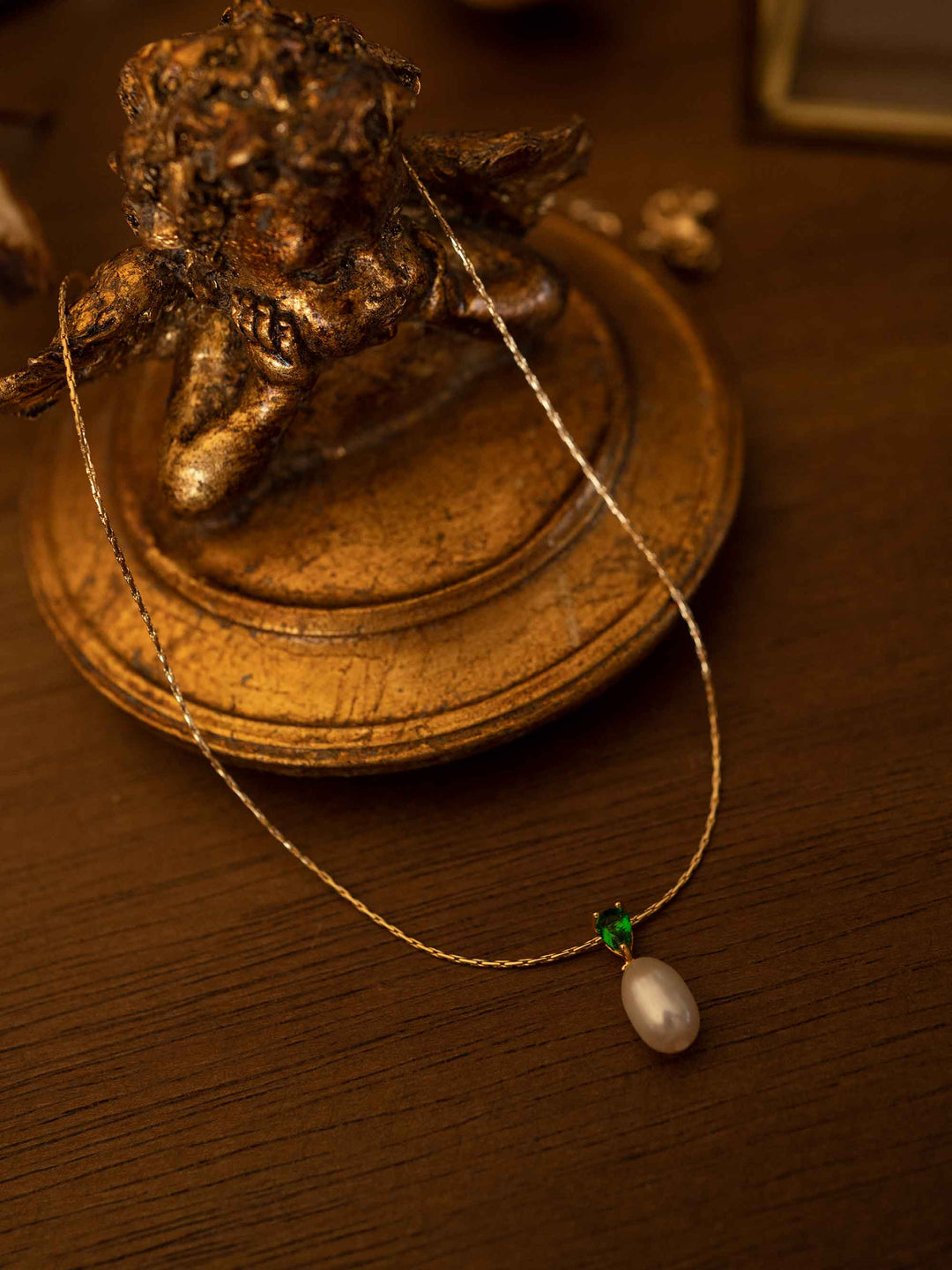 A pearl necklace with a minimalist design