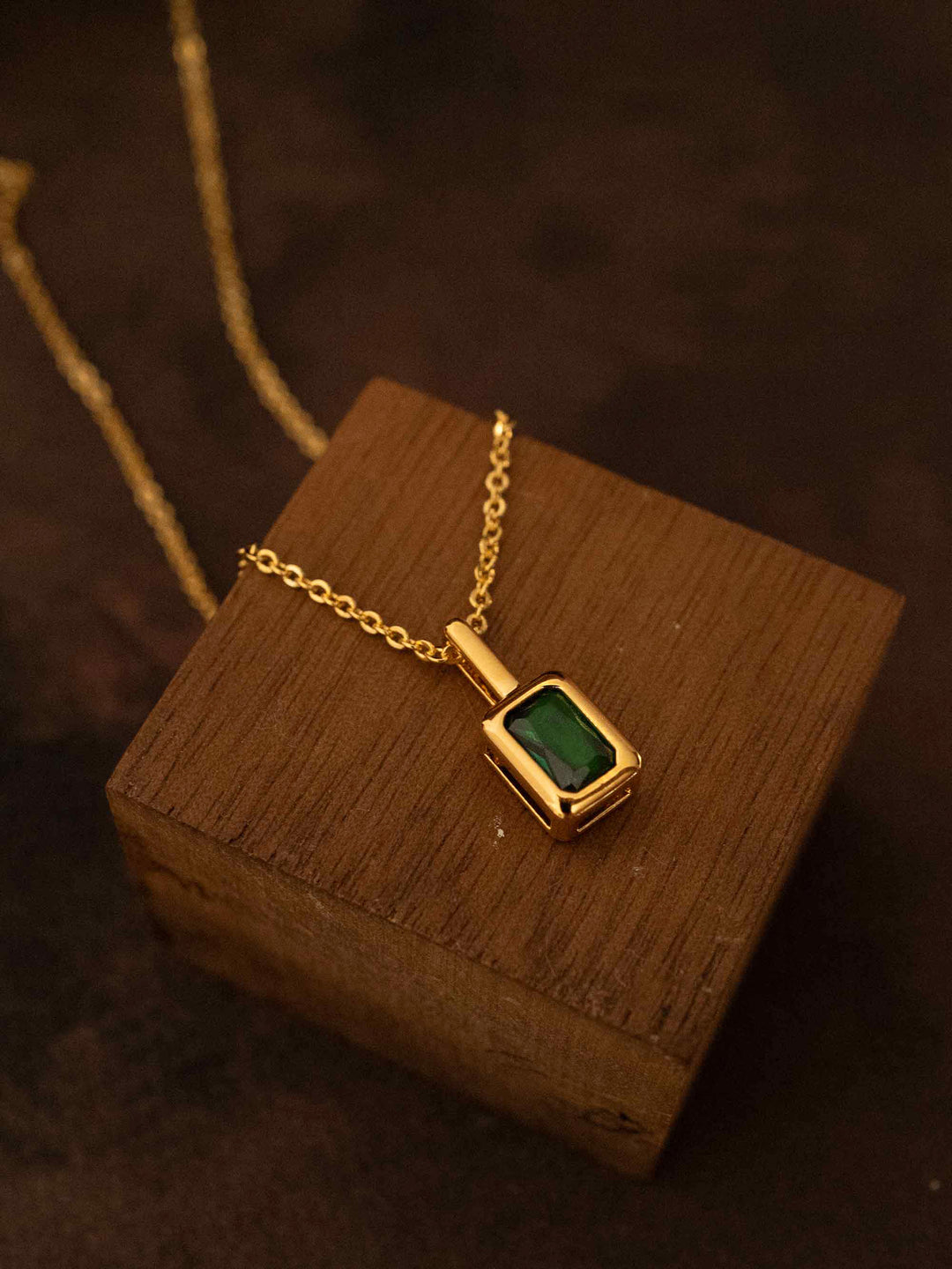 A mini green crystal pendant gold necklace