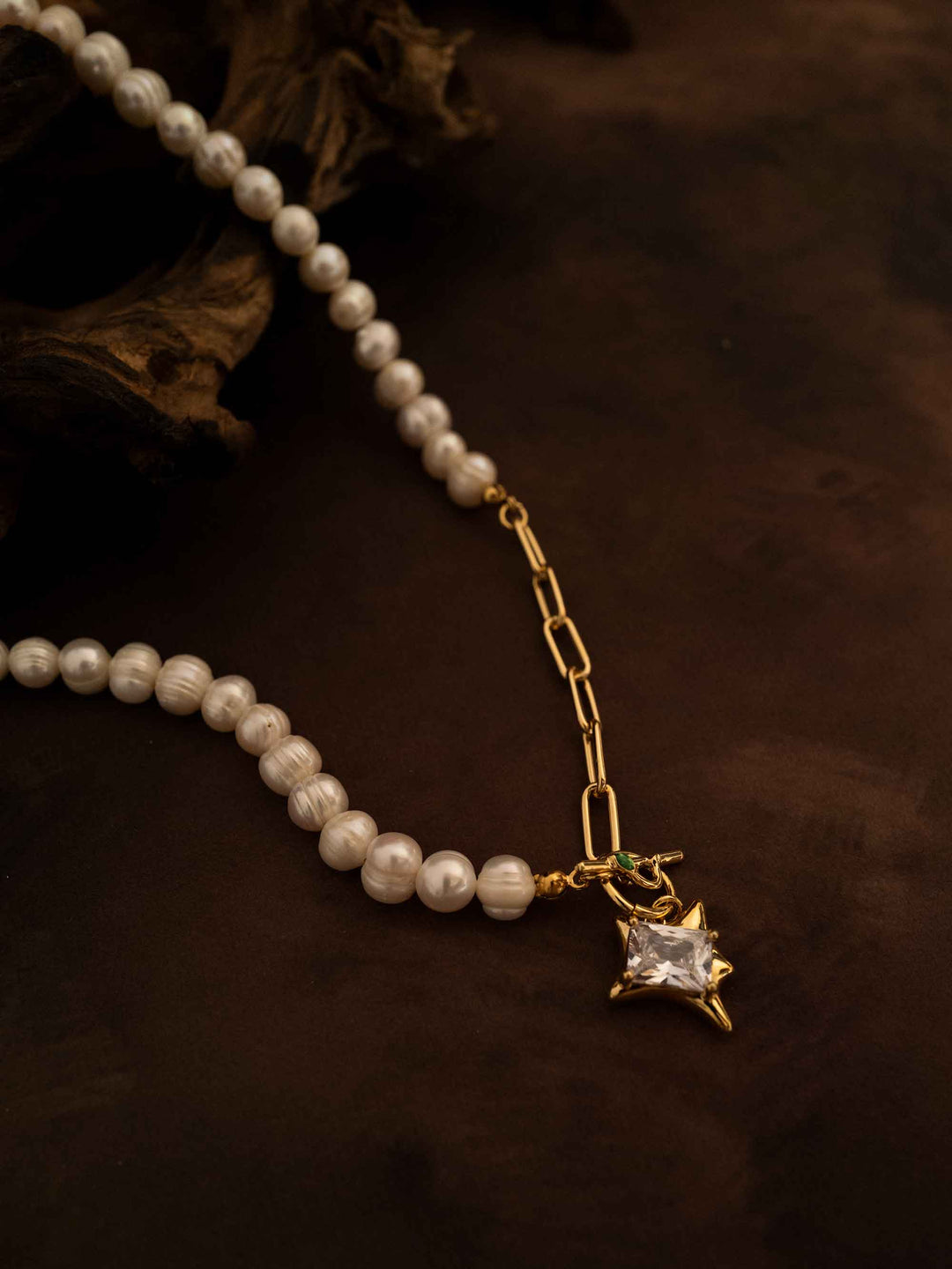 A pearl necklace with square zirconia