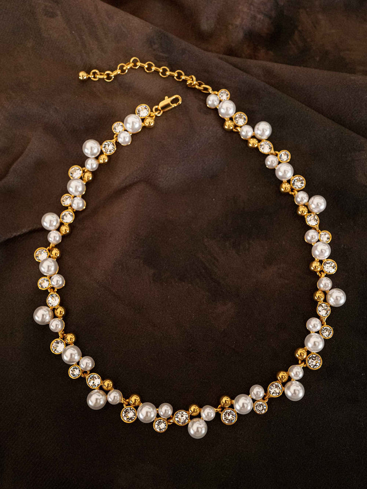 A necklace of pearls and glass crystals