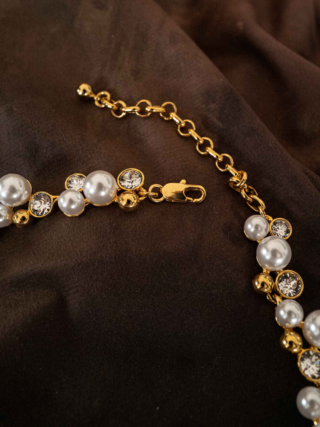 A necklace of pearls and glass crystals