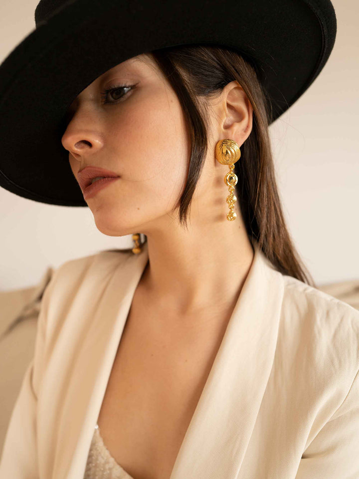 Elegant Long Gold Wavy Earrings