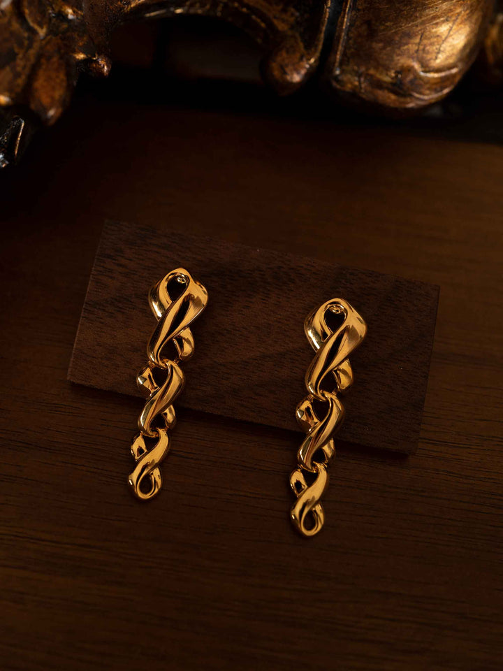 Cross braided gold long earrings