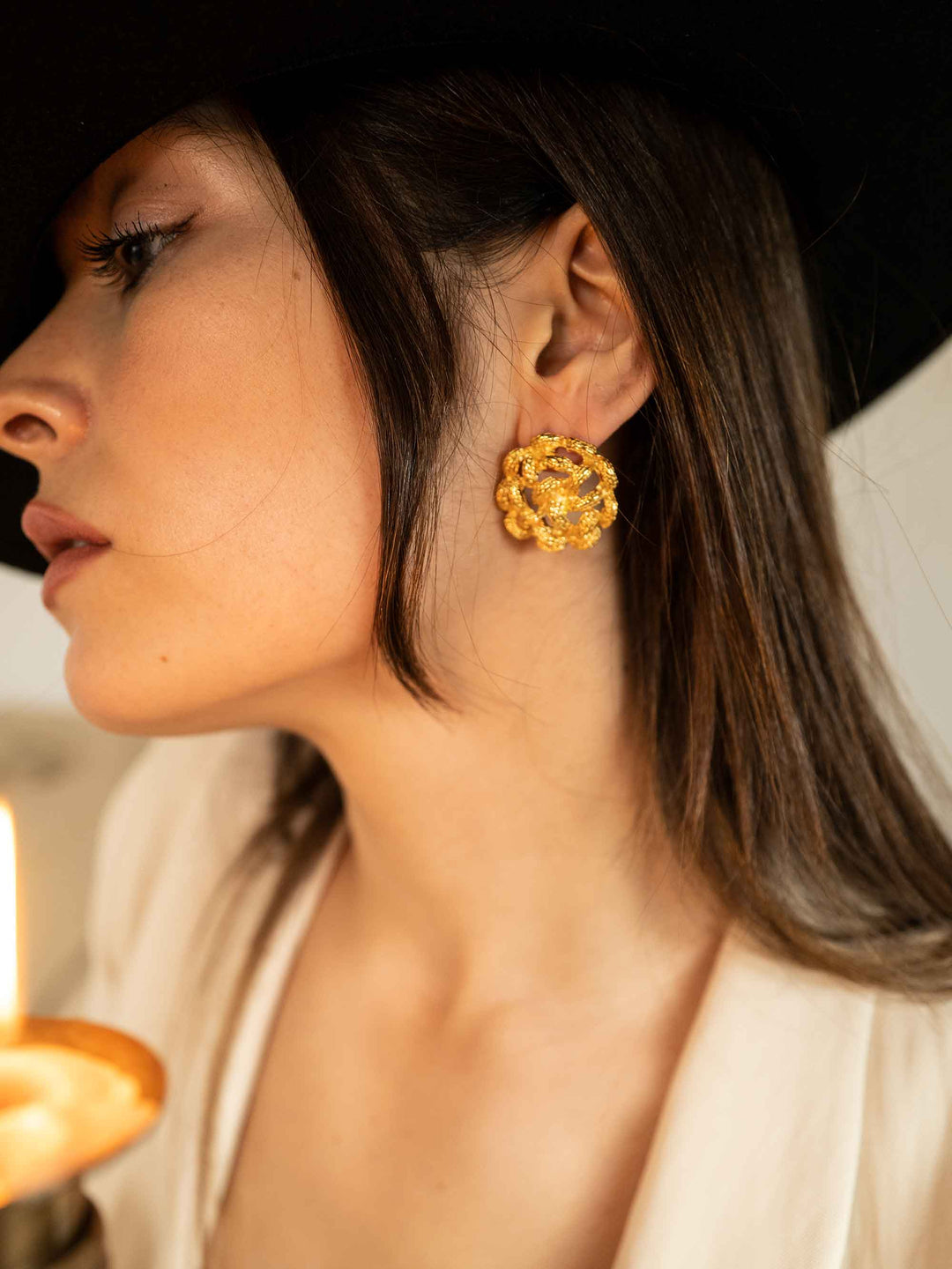 model wear Golden Hollow Flower Earrings