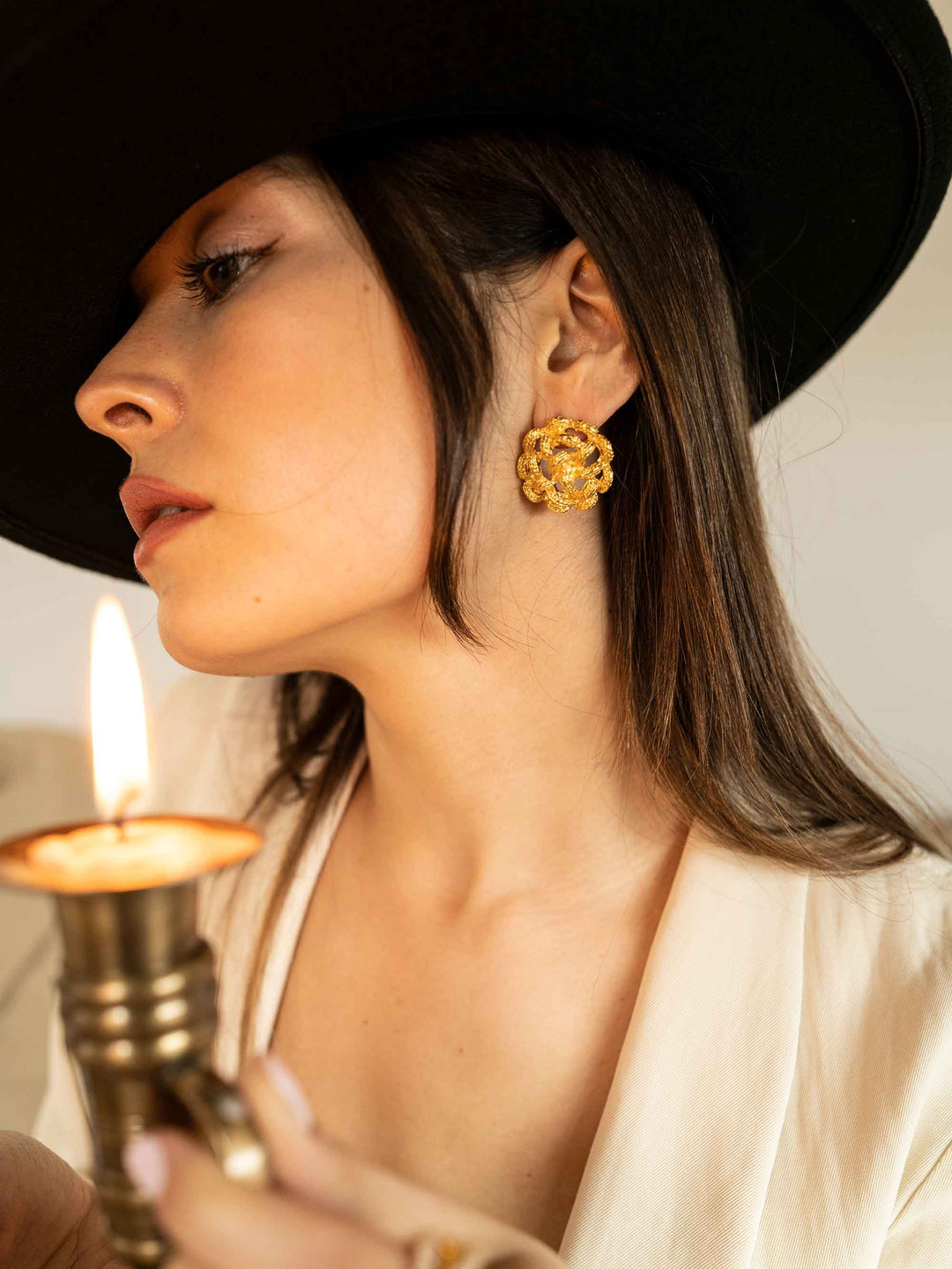 model wear Golden Hollow Flower Earrings