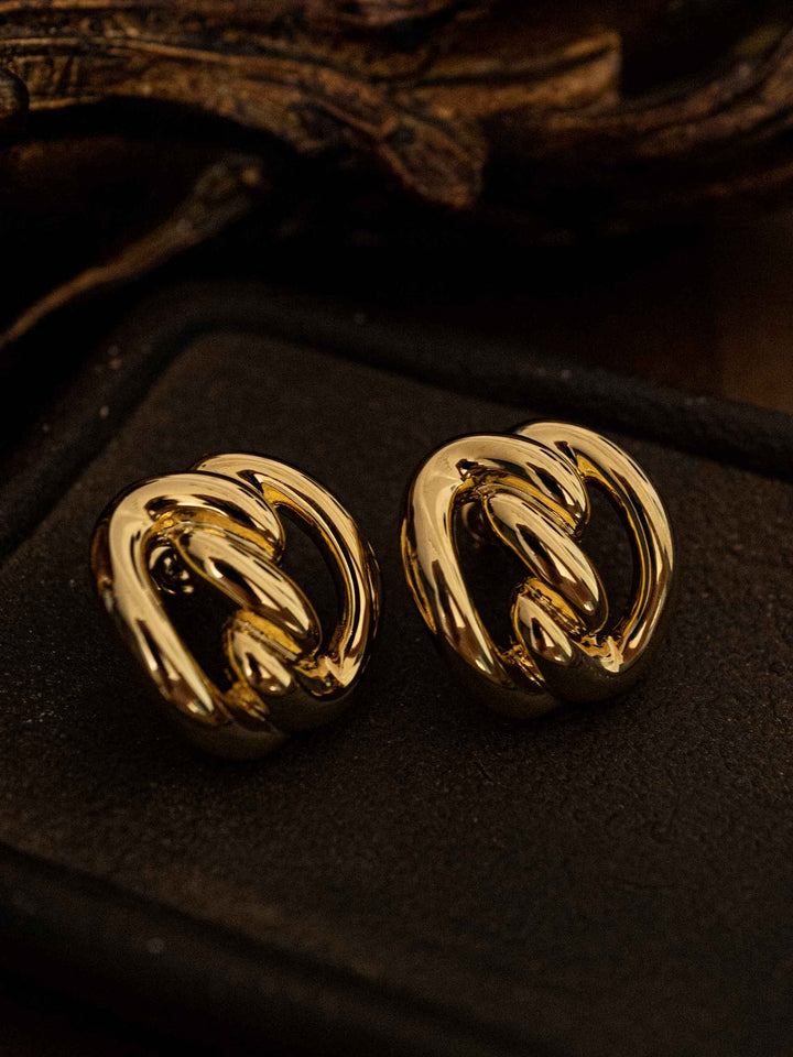 One Cutout Round Gold Earrings