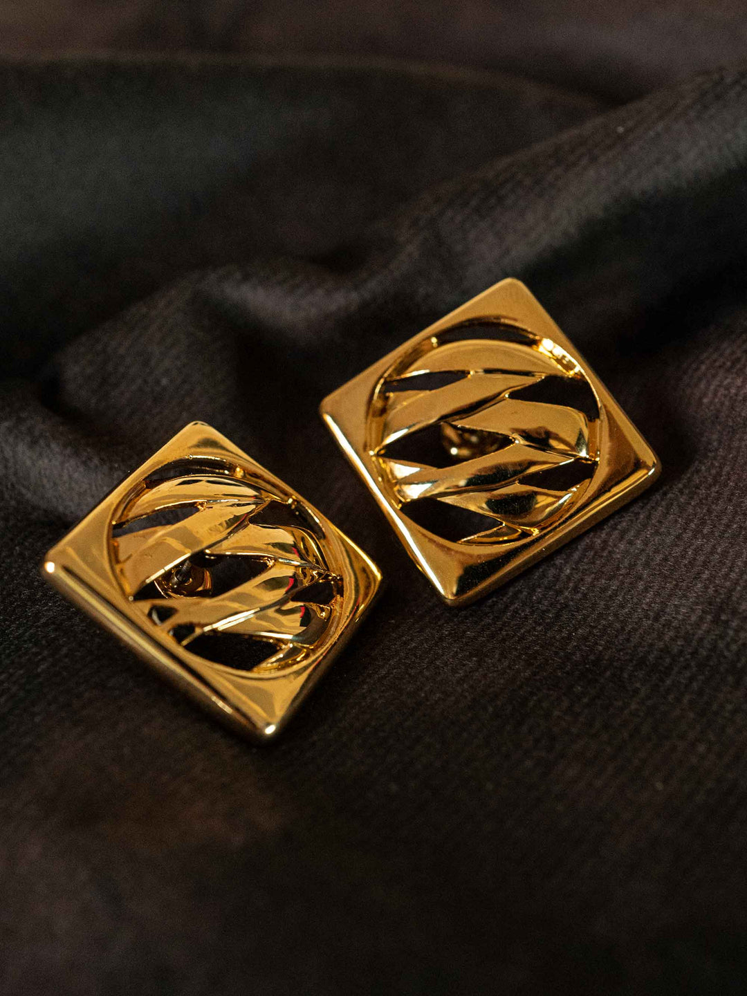 A pair of 18k gold plated square cut out earrings