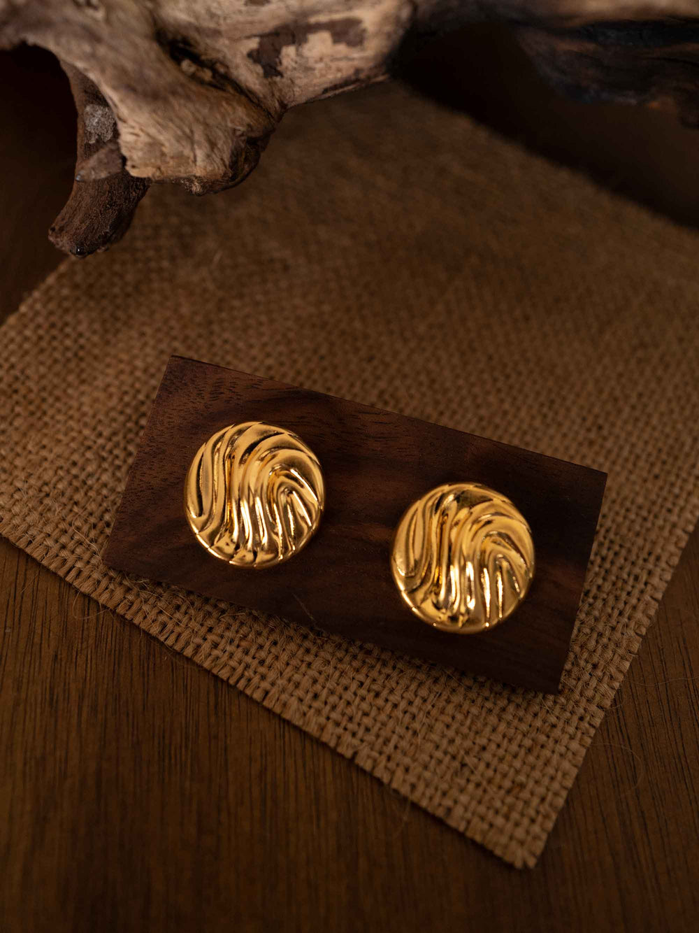 Gold round earrings