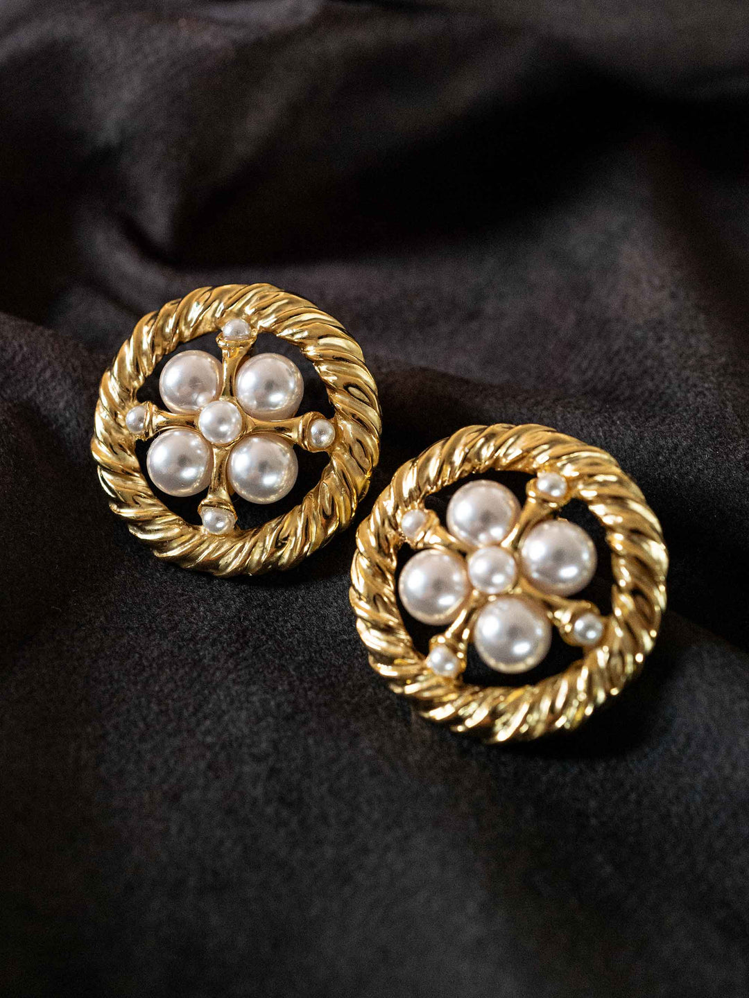 A pair of gold openwork pearl earrings