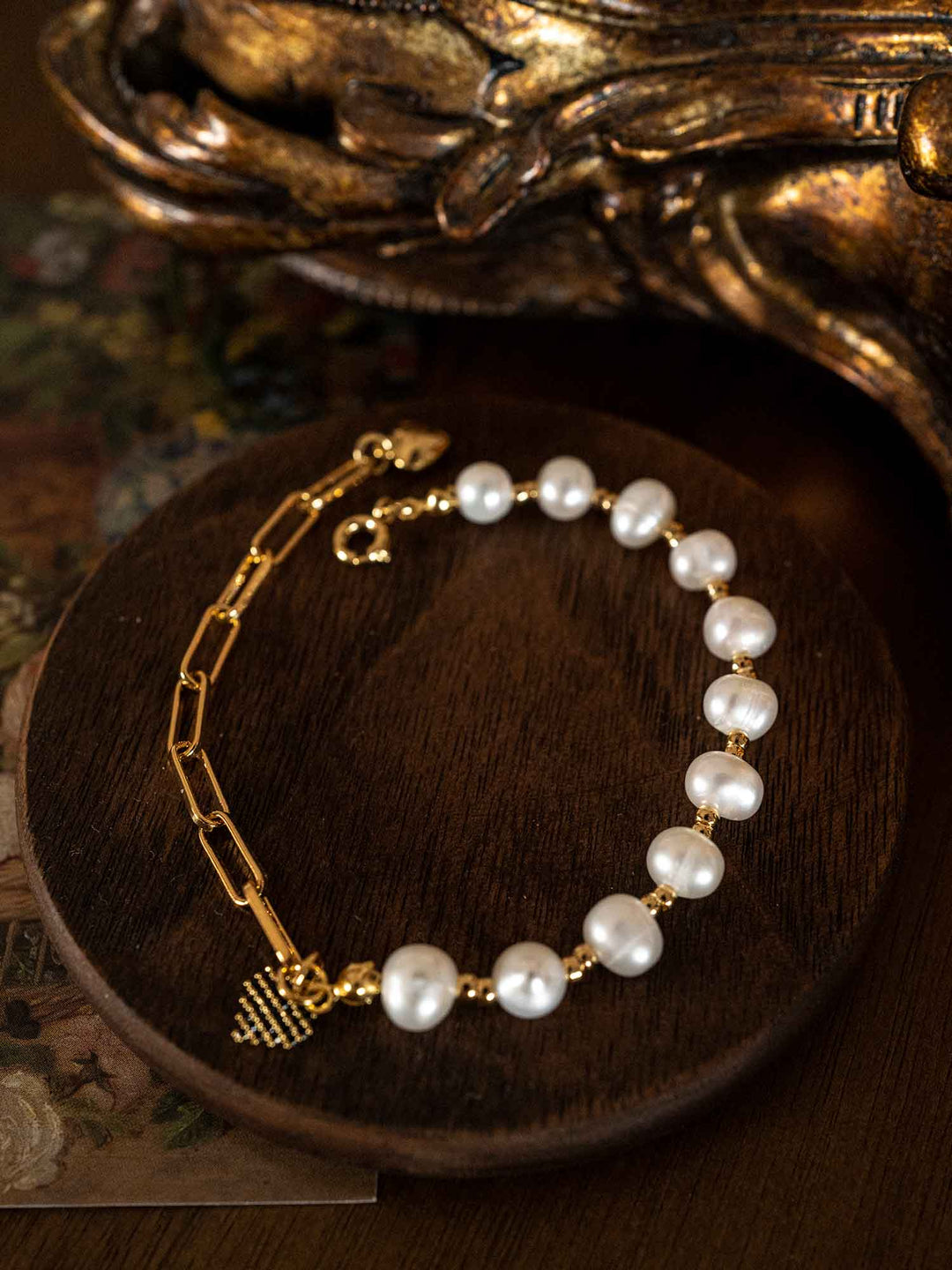 A love charm pearl bracelet
